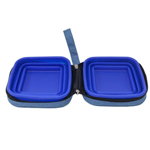 a flattened image of a portable water and food dog bowl