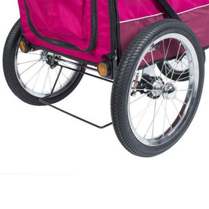 close up image of the wheels of a red dog stroller