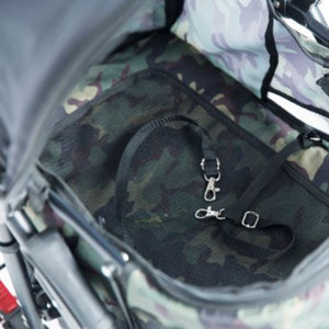 close up image of what's inside of a green camo dog stroller and a close u view of a safety strap for dog leash