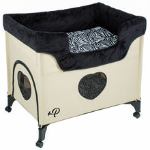 side view image of a cream bedside dog lounge with zebra prints facing right 