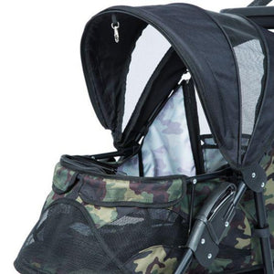 a close up image of the top part of the green camo dog stroller where you can see the top cover open