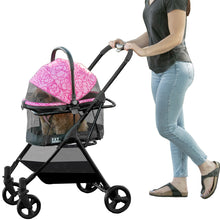 a woman pushing a pink floral design dog stroller in white background