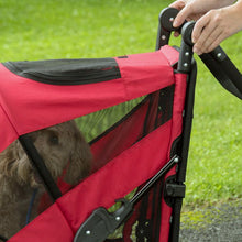 a close up image on a dog stroller's handle bar with a fluffy dog inside