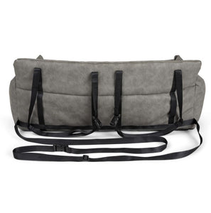 back view image of a grey dog car bed with safety straps 