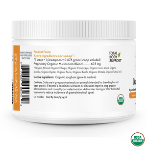 
A white plastic jar of "WHOLISTIC PET ORGANICS MUSHROOMS" dietary supplement. The label on the back lists the "Product Facts," including "Active Ingredients per scoop*." The proprietary blend contains organic almond, Chaga, Cordyceps, Lion's Mane, Maitake, Oyster, Poria, Reishi, Shiitake, and Turkey Tail mushrooms. It also mentions a warning for pregnant or breeding animals and provides a lot number.
