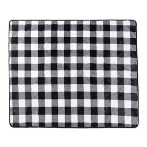 full laid out black and white checkered patterned dog blanket