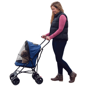 a woman walking her dog in a blue stroller in white background