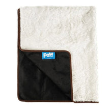 a folded white dog blanket with non slip bottom and blue tag of paw.com