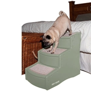 a pug descending a three step sage dog stair next to a brown bed with white beddings 