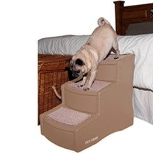 a pug descending a three step tan dog stair next to a brown bed with white beddings 