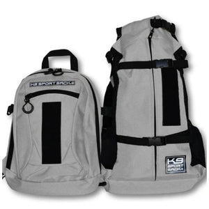 front view image of a pair of grey dog backpack carrier with side pockets 