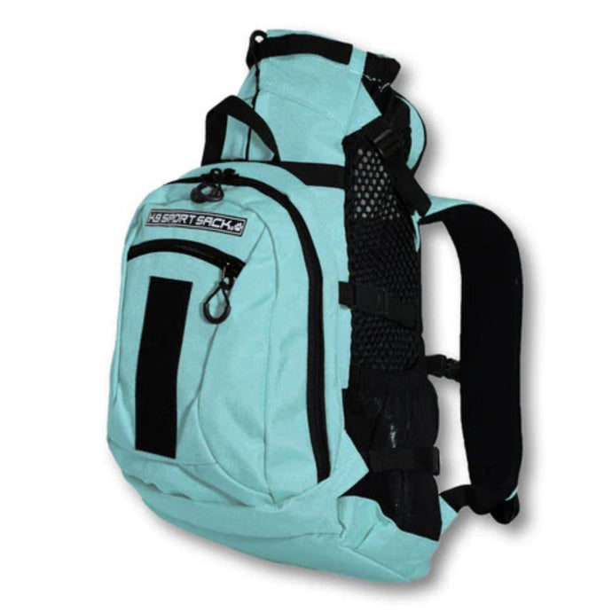 side view image of a light blue dog backpack carrier with side pockets