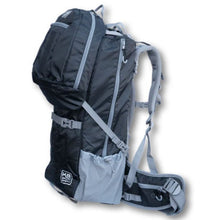 side view image of a blue dog backpack carrier with side pockets and belt strap
