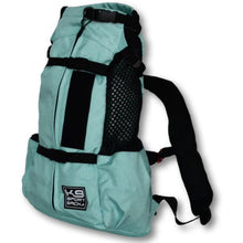 a front image facing partially right of a light blue dog backpack with side pockets and backpack straps 
