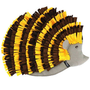 Top view image of a yellow and brown colored hedgehog dog snuffle pad 