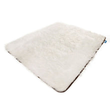 A full view of a polar white waterproof dog blanket 