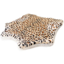 A soft furry curved dog bed with cheetah pattern