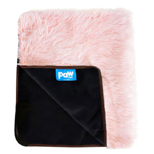 A waterproof blush pink dog blanket almost folded in half showing a logo of paw.com in a black background 
