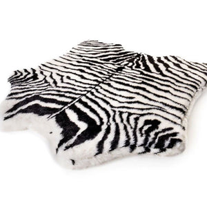 A curve soft and furry zebra printed dog bed