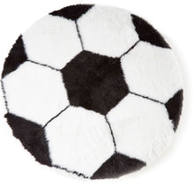 A top view of a soccer ball shaped dog bed 