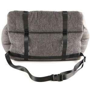rear view of a grey car dog bed with safety lock in black strap 
