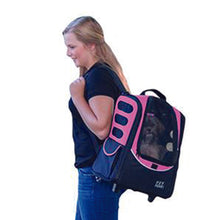 a lady in blue carrying her dog on her shoulder through a Pink 5-in-1 Pet Carrier [Backpack/Tote/Roller Bag/Carrier/Car Seat