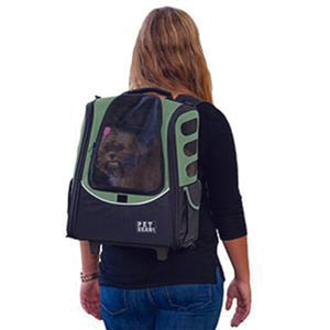 a lady in black carrying her dog through a Sage 5-in-1 Pet Carrier [Backpack/Tote/Roller Bag/Carrier/Car Seat on her back