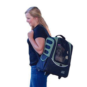 a lady in blue carrying her dog on her shoulder through a Sage 5-in-1 Pet Carrier [Backpack/Tote/Roller Bag/Carrier/Car Seat