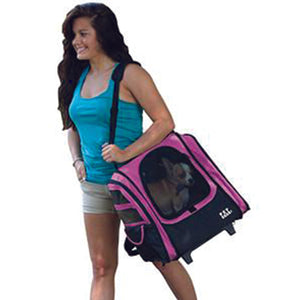 a lady carrying her dog on her back inside a 5-in-1 Pet Carrier Backpack/Tote/Roller Bag/Carrier/Car Seat, Pink