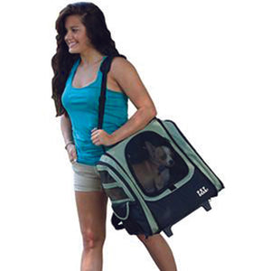a lady carrying her dog on her back inside a 5-in-1 Pet Carrier Backpack/Tote/Roller Bag/Carrier/Car Seat, Sage