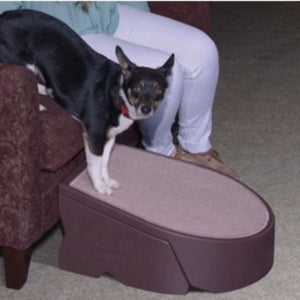a close up image of a small dog getting off the brown couch through Pet Gear One Step, Chocolate