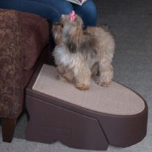 a close up image of a shih-tzu standing on a Pet Gear One Step, Chocolate next to a lady sitting on a brown couch