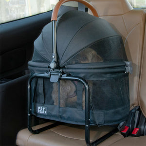a black dog carrier tucked at the backseat of the car