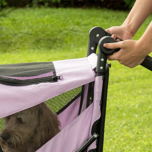 a close up image of a dog stroller's handle bar with a fluffy dog inside