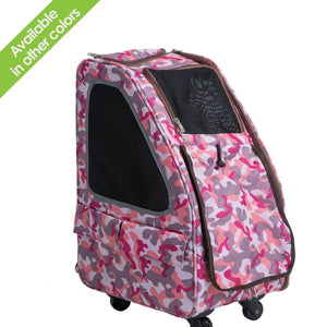 Front view of a pink camo dog carrier facing right