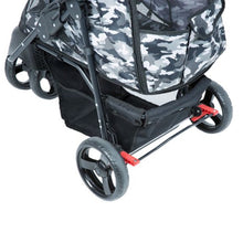 a close up image of the back wheels of a balck camo colored dog stroller and a break lock in red 