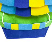 a close up image of a yellow and blue shaded puzzle pad for dogs