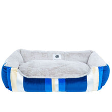 top view image of a blue dog bed 