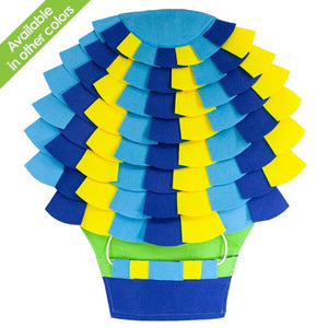 a yellow and blue shaded puzzle pad for dogs arranged like a hot air balloon