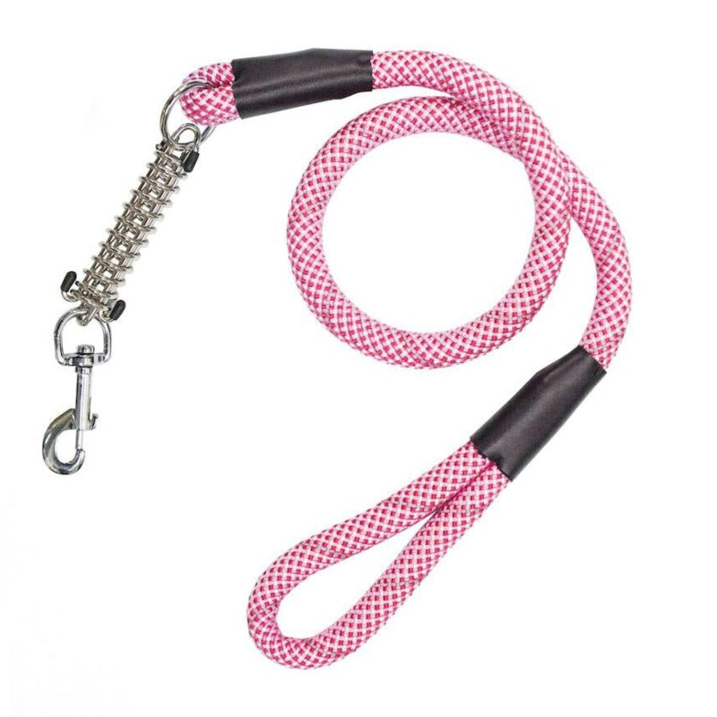 a candy cane colored reflective dog leash with safety lock at the end