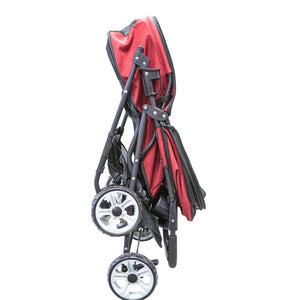 a folded red dog stroller with black frames and wheels 