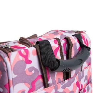 close up view of the handle of a pink camo dog carrier