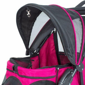 an open top cover of a razzberry colored dog stroller and a hanging safety lock 