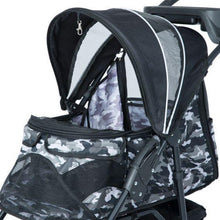 a close up image of the top part of the black camo dog stroller where you can see the top cover open 