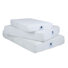three white memory foam dog bed stacked together