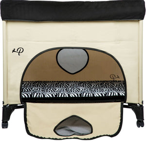 front view image of a cream bedside dog lounge with zebra prints with its front door open