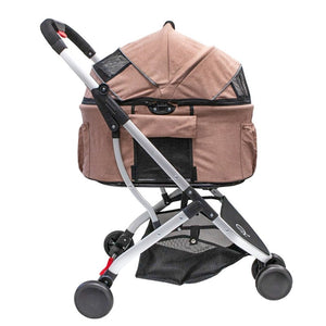 side view image of a dessert rose colored dog stroller facing right 