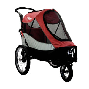 a dog stroller with rain cover on in white background