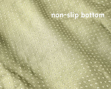 a close up image of a non slip bottom for dog couch lounger 