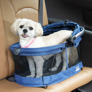 a close up image of a dog in the car seat inside a Midnight River View 360 Carrier